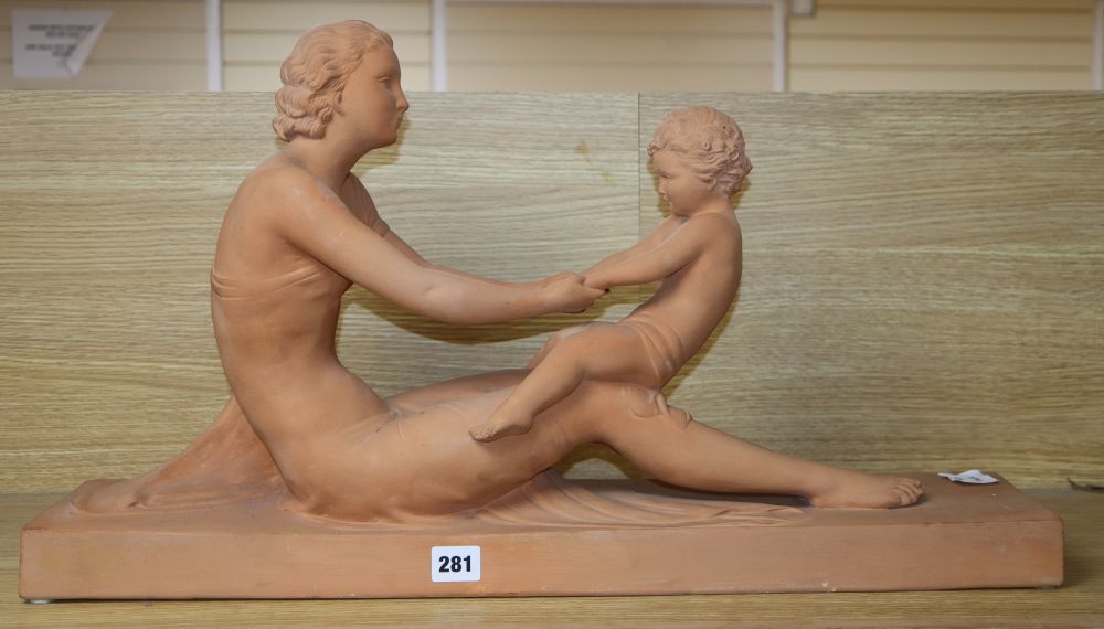 A French Art Deco terracotta figure of a mother and child, signed Ugo Cipriani (1887-1960), length 67cm